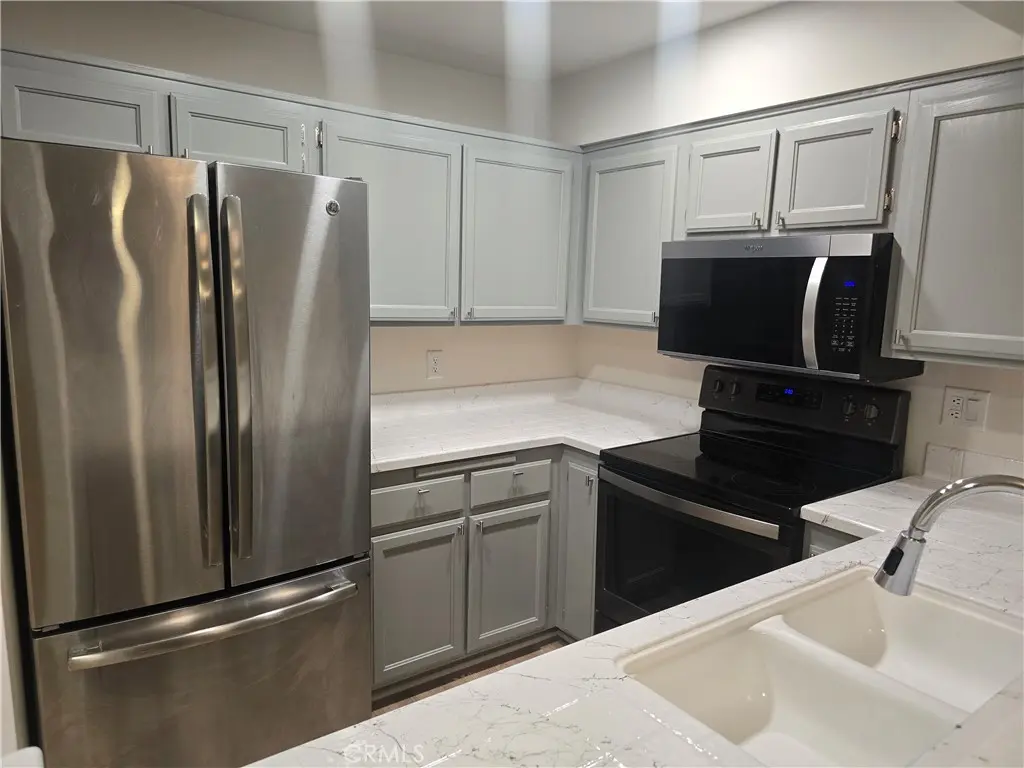 11410 Brookshire 325, Downey, CA — listing photo 1